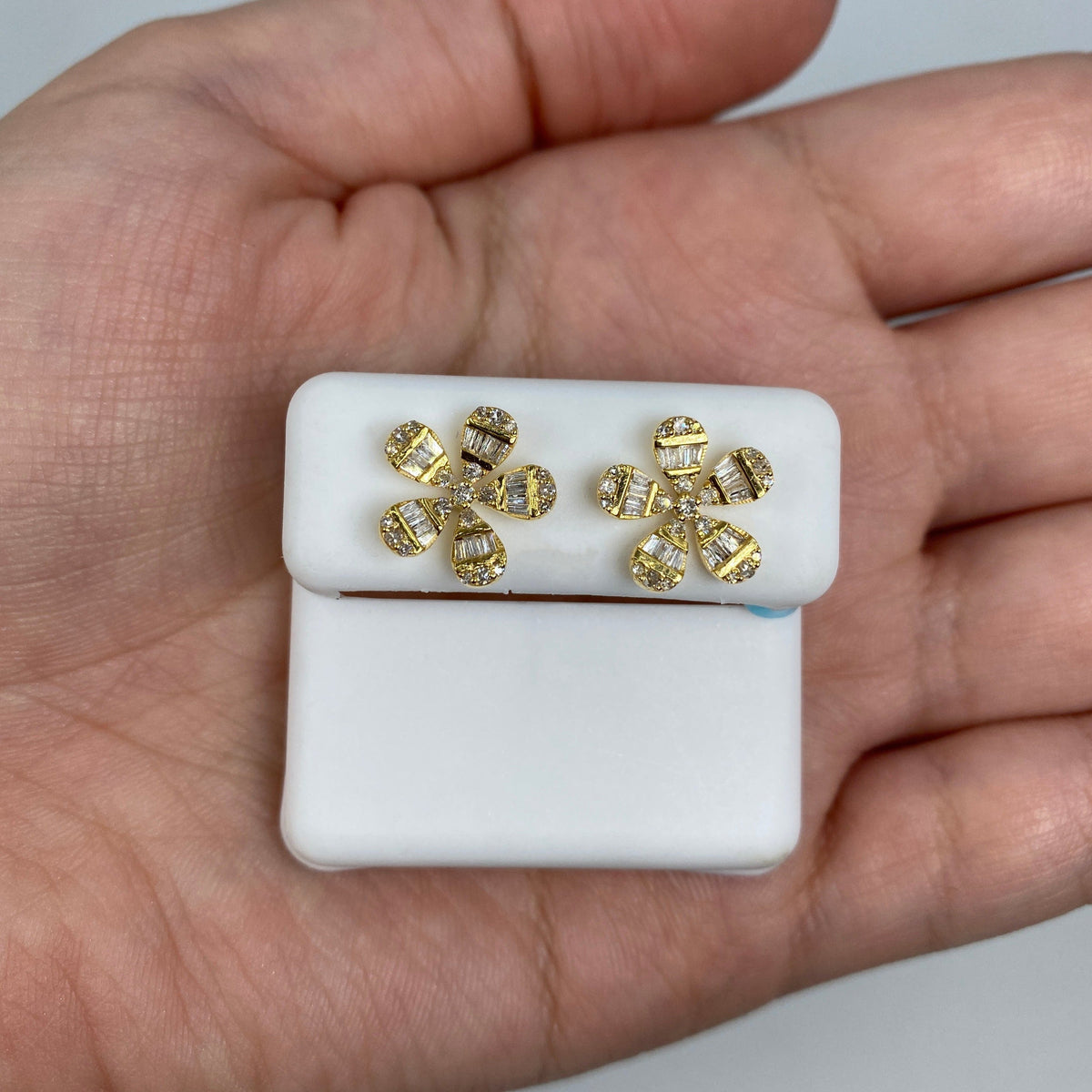 14K Gold Flower Baguette Diamond Earrings in yellow gold - close-up product photo