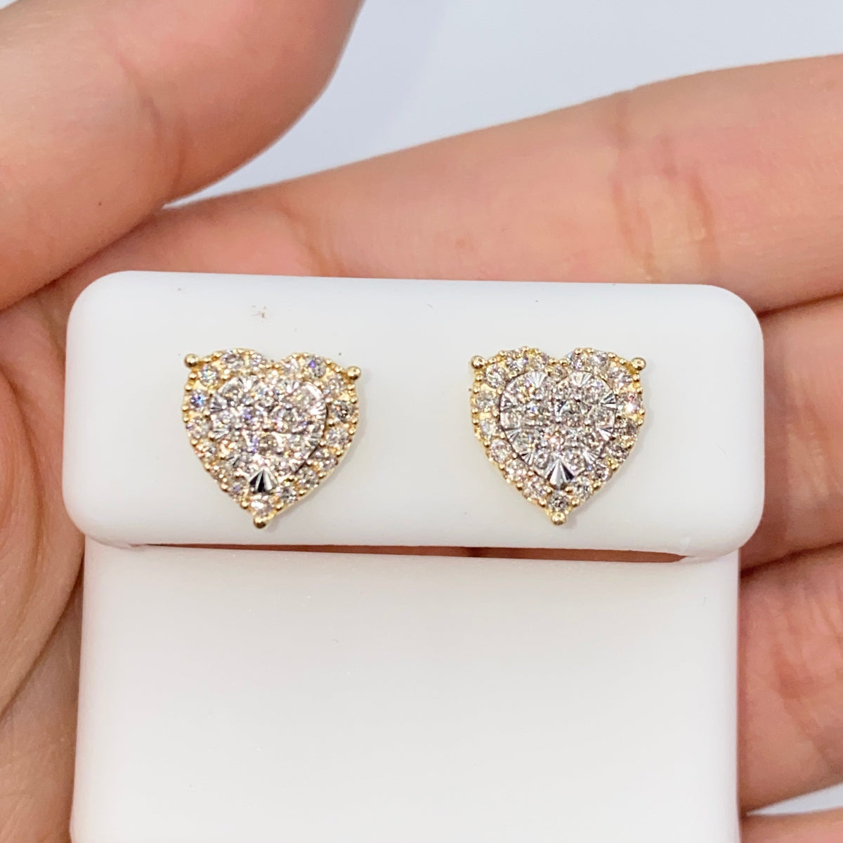 14K Gold Halo Heart Iced Diamond Earrings in yellow gold, Medium - close-up product photo