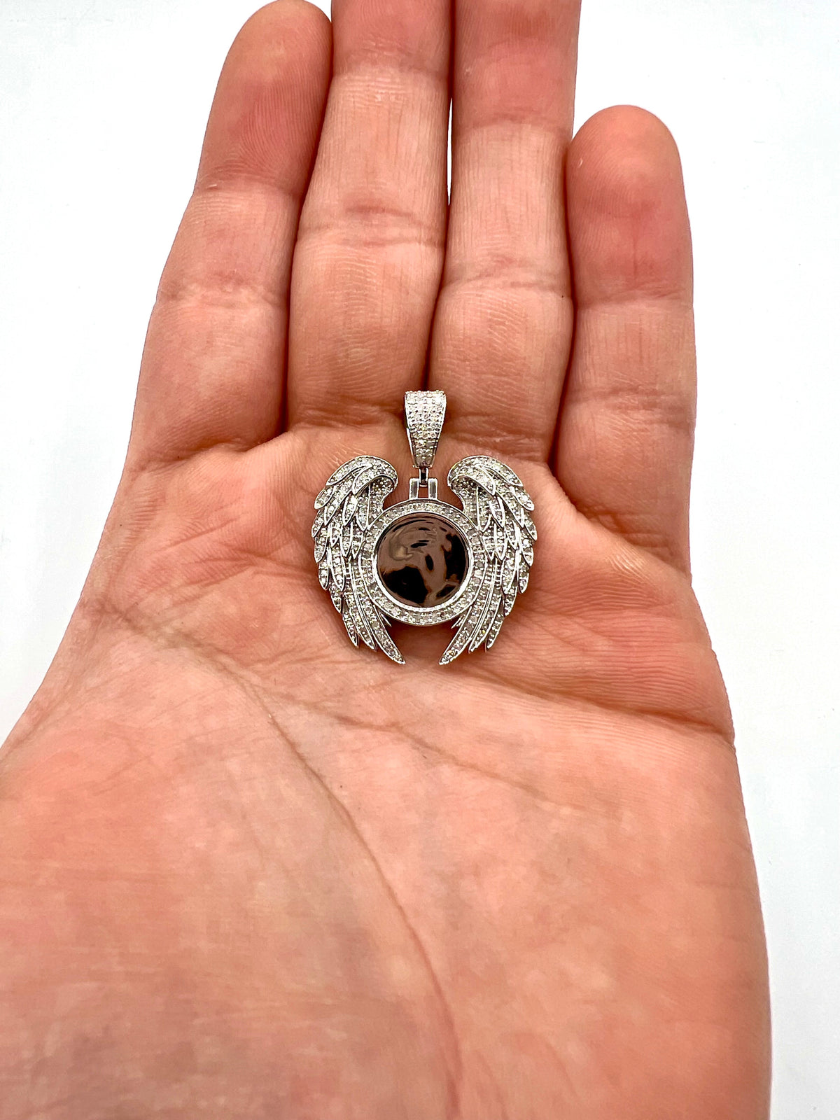 10K Gold Angel Wing Photo Diamond Pendant in white gold - close-up product photo