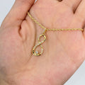 10K Gold Diamond Infinity Pendant in yellow gold - close-up product photo
