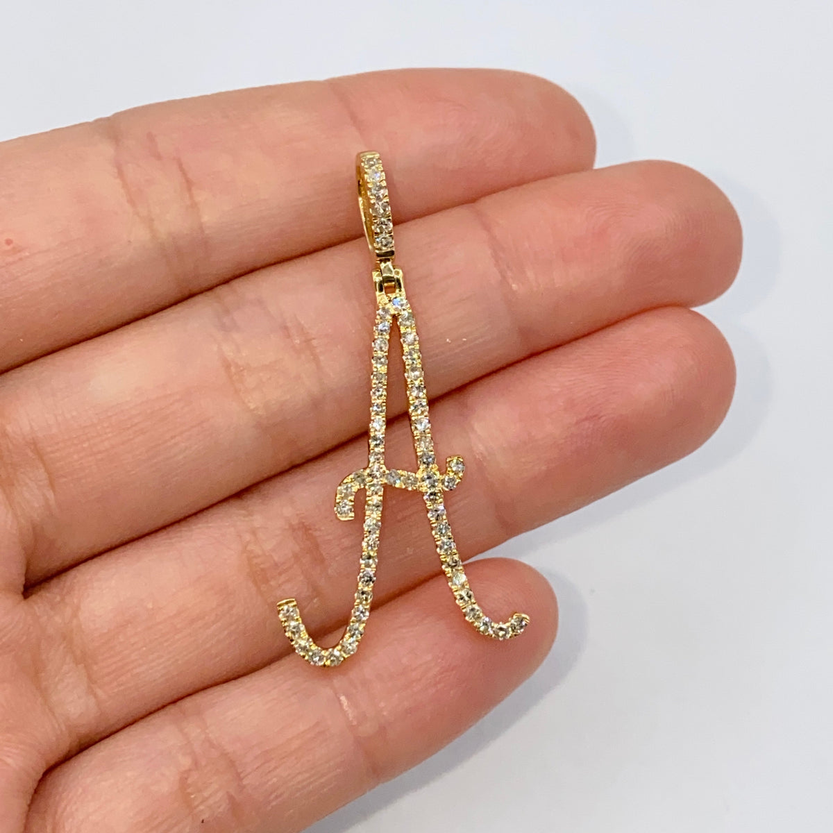 14K Gold Small Initial Letter Script Diamond Pendant Full Collection in yellow gold - close-up product photo
