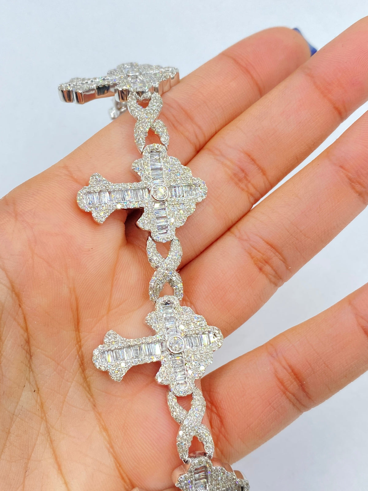 10K Gold Baguette Cross Infinity Diamond Bracelet in white gold - close-up product photo
