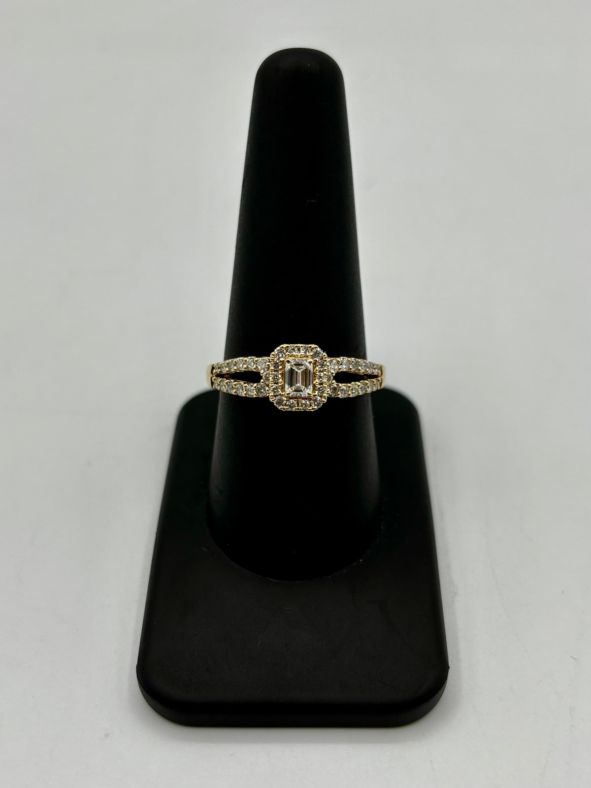 14K Gold Lovely Emerald Cut Lab Diamond Center Engagement Ring in gold - close-up product photo