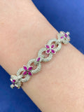 10K Gold Infinity Flower Diamond & Pink Gemstone Bracelet in white gold - close-up product photo