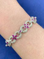 10K Gold Infinity Flower Diamond & Pink Gemstone Bracelet in white gold - close-up product photo