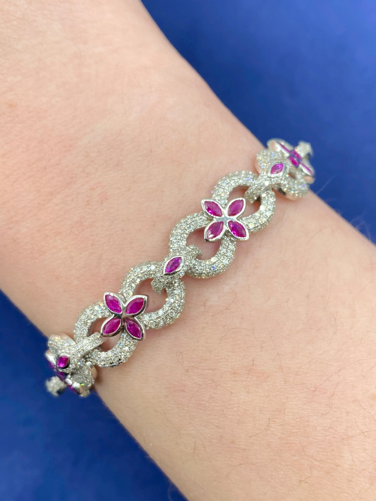 10K Gold Infinity Flower Diamond & Pink Gemstone Bracelet in white gold - close-up product photo