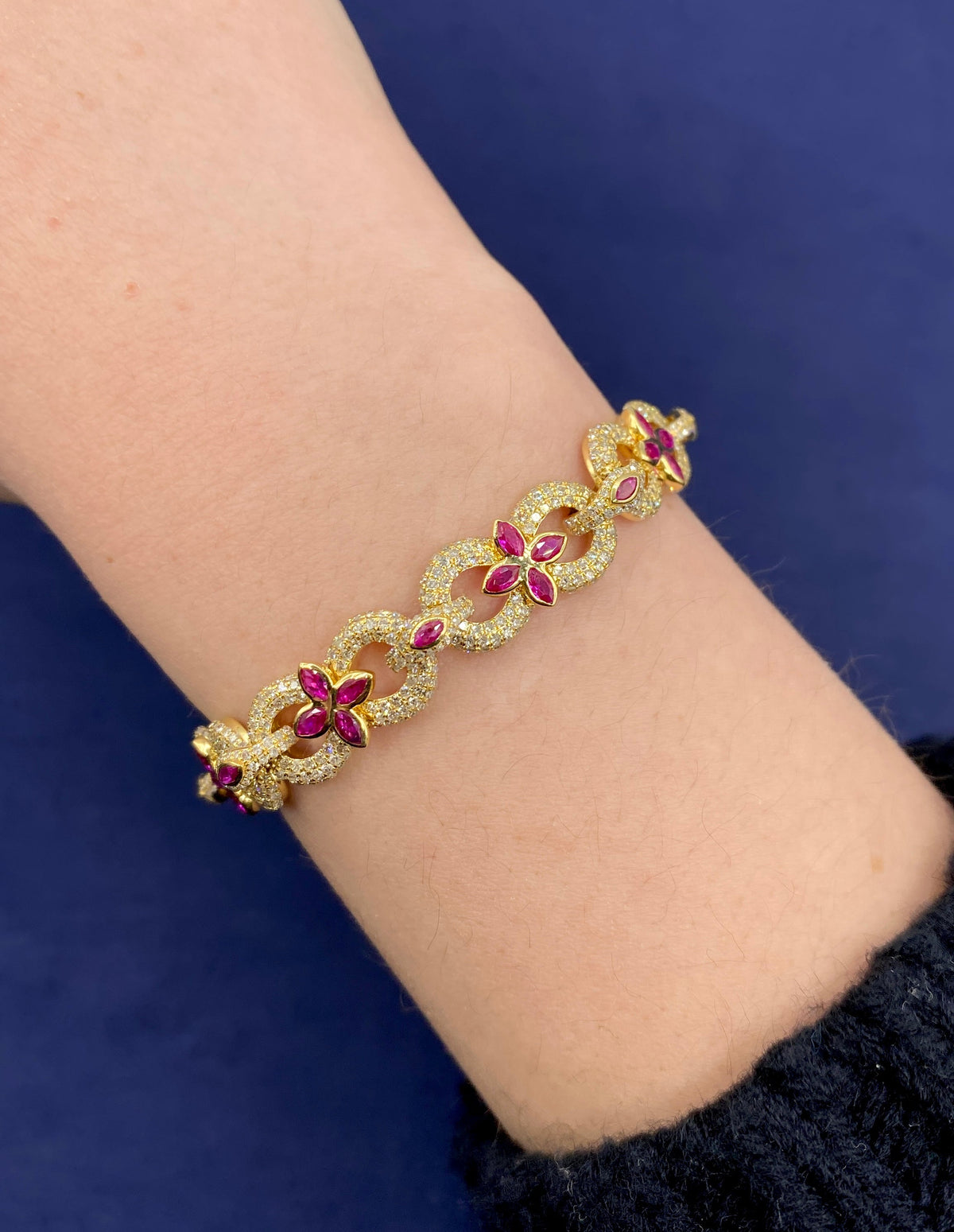 10K Gold Infinity Flower Diamond & Pink Gemstone Bracelet in yellow gold - close-up product photo