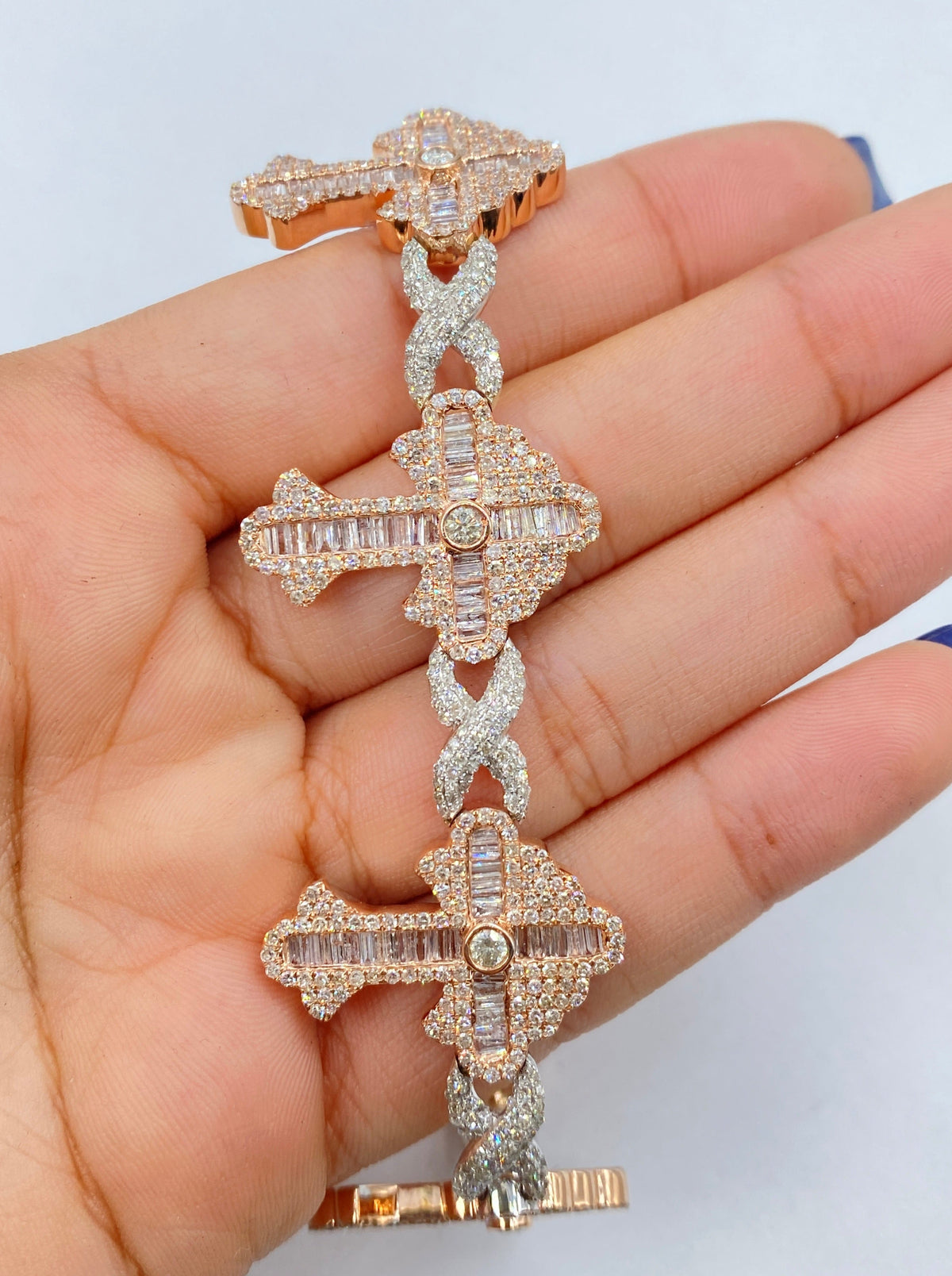 10K Gold Baguette Cross Infinity Diamond Bracelet in rose gold - close-up product photo
