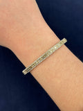 14K Gold Baguette Diamond Bangle Bracelet 5.4mm in yellow gold - close-up product photo