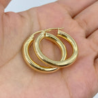 14K Gold Hoop Earrings 4mm, 1.2" - close-up product photo