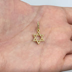 14K Gold Star of David Diamond Pendant in yellow gold, Medium - close-up product photo