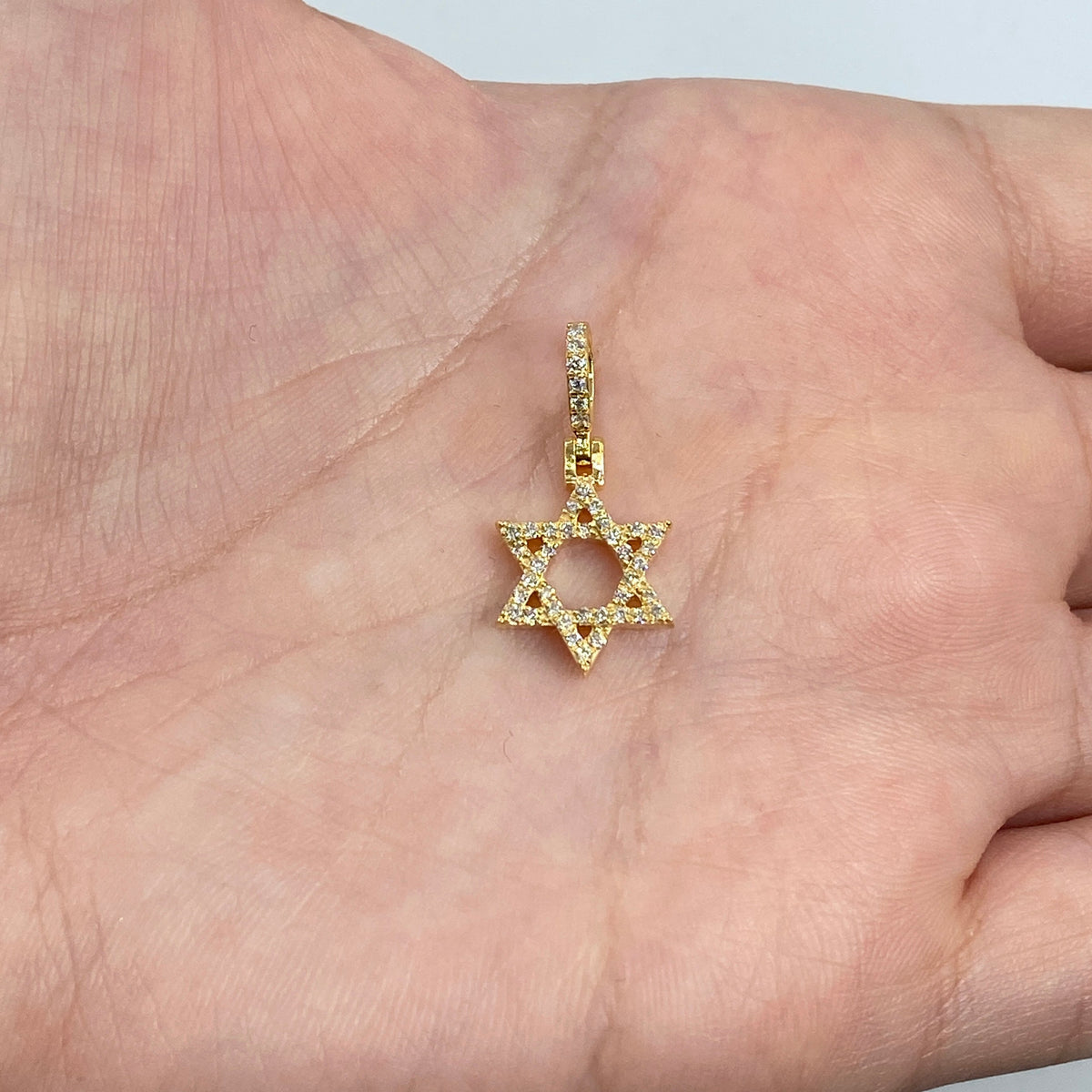 14K Gold Star of David Diamond Pendant in yellow gold, Medium - close-up product photo