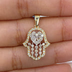 14K Gold Heart Hamsa Diamond Pendant in yellow gold - close-up product photo