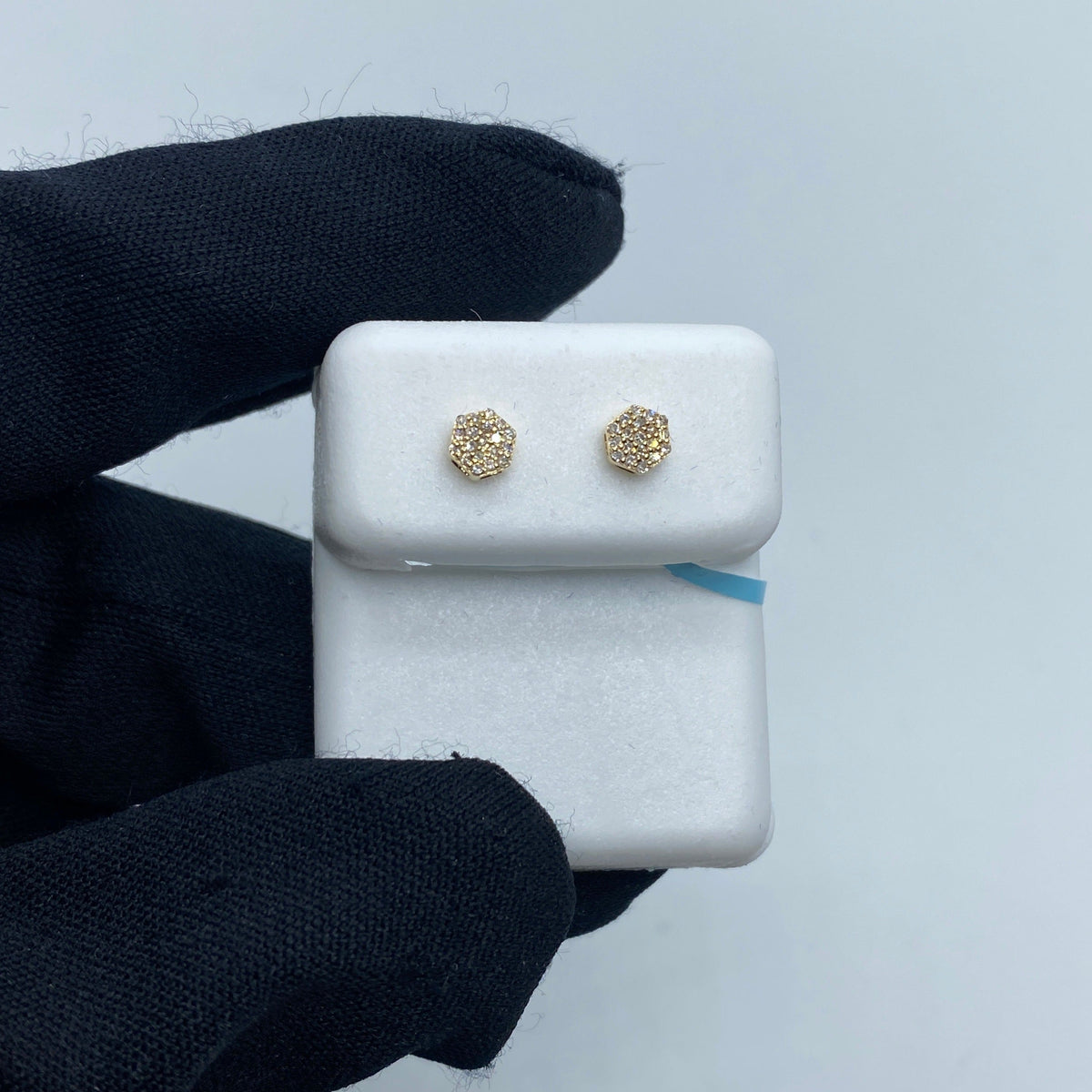 14K Gold Flower Diamond Earrings in yellow gold - close-up product photo