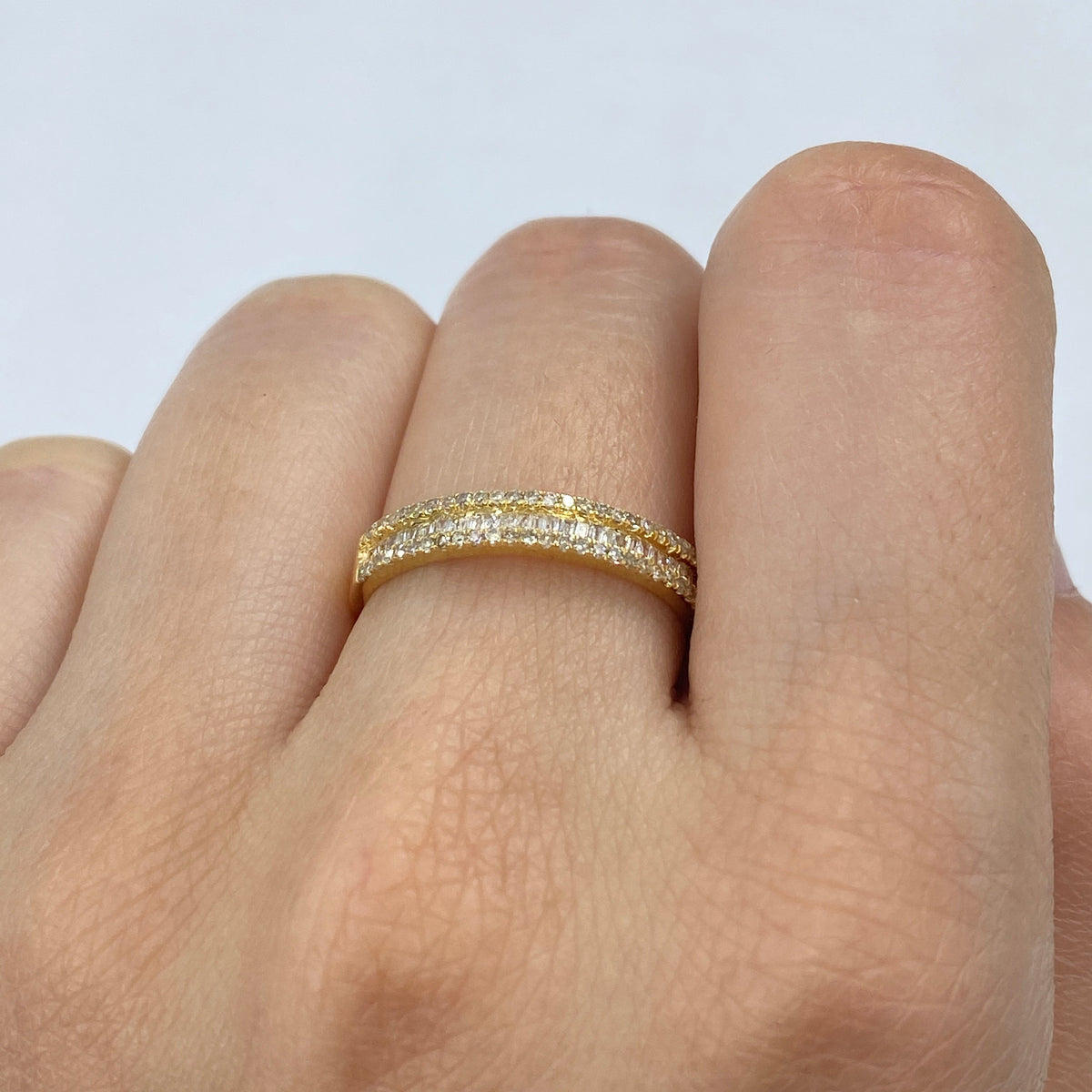 10K Gold Diamond Baguette Band in yellow gold, 3.3mm - close-up product photo