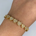 14K Gold 9mm Hearts Link Diamond Baguette Bracelet 6.5–7.5 in in yellow gold, 6.5" - close-up product photo