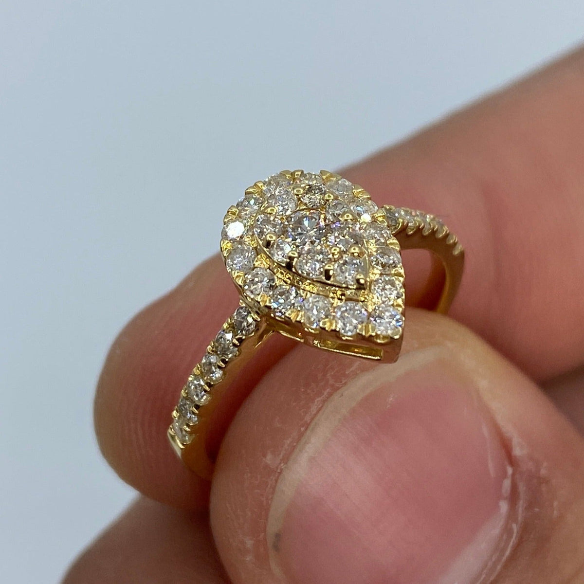 14K Gold Pear Shape Diamond Engagement Ring in yellow gold - close-up product photo