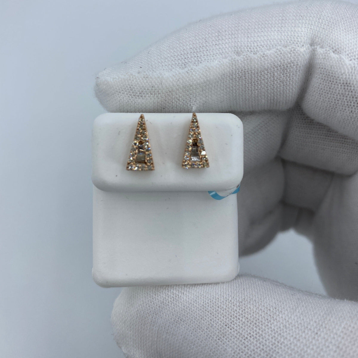 14K Gold Large Isosceles Triangle Diamond Baguette Earrings in rose gold - close-up product photo