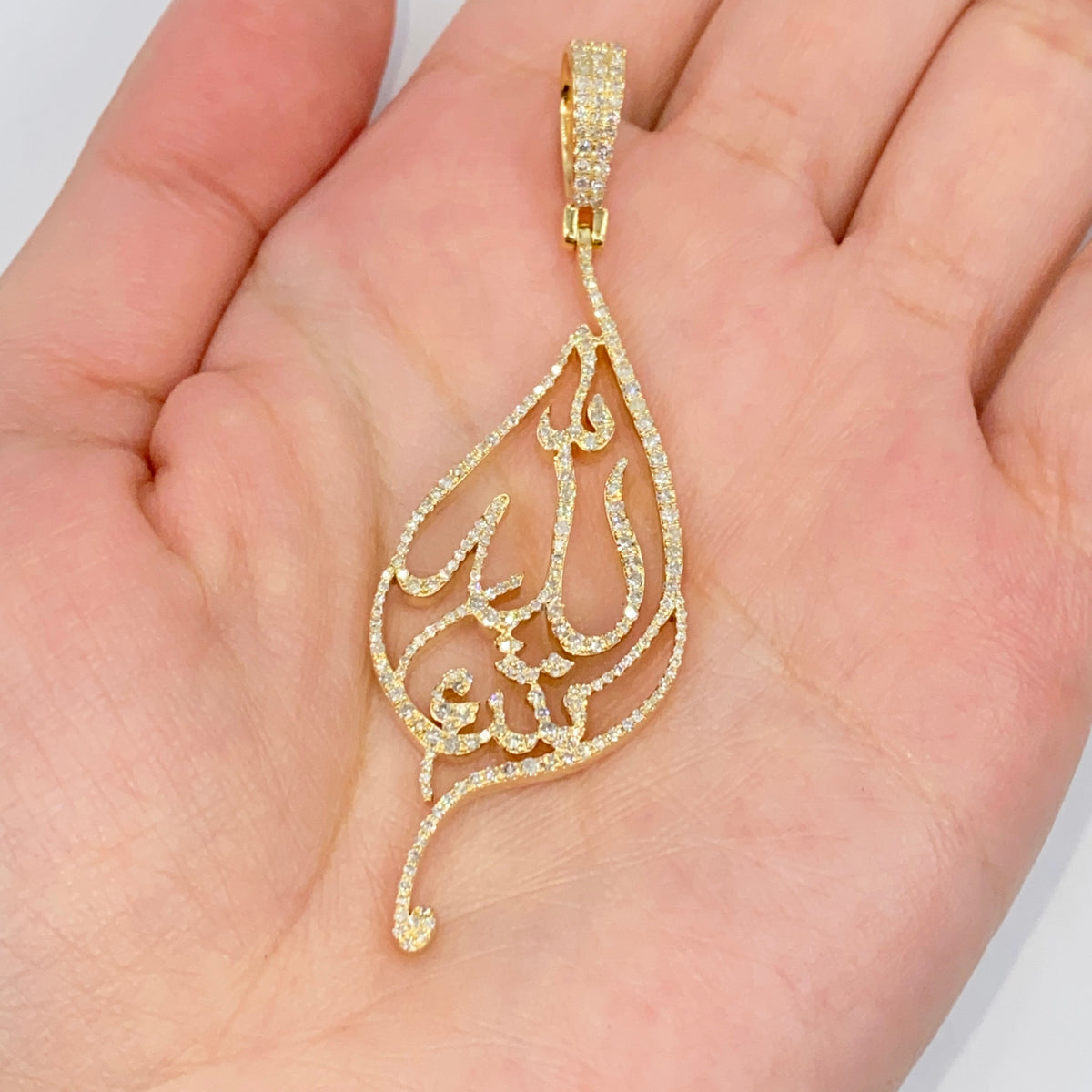14K Gold Allah Leaf Diamond Pendant in yellow gold - close-up product photo