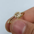 14K Gold Minimal Diamond Baguette Engagement Ring in yellow gold - close-up product photo