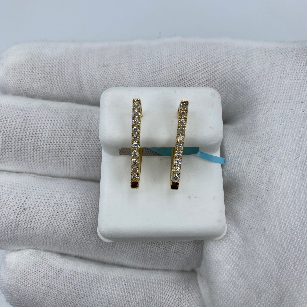 14K Gold Triangle Hoop Diamond Earrings in yellow gold - close-up product photo