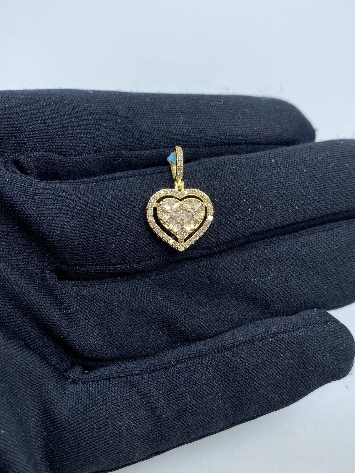 14K Gold Heart Diamond Baguette Gap Pendant in yellow gold - close-up product photo