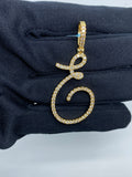 14K Gold Initial E Large Script Diamond Pendant in yellow gold - close-up product photo