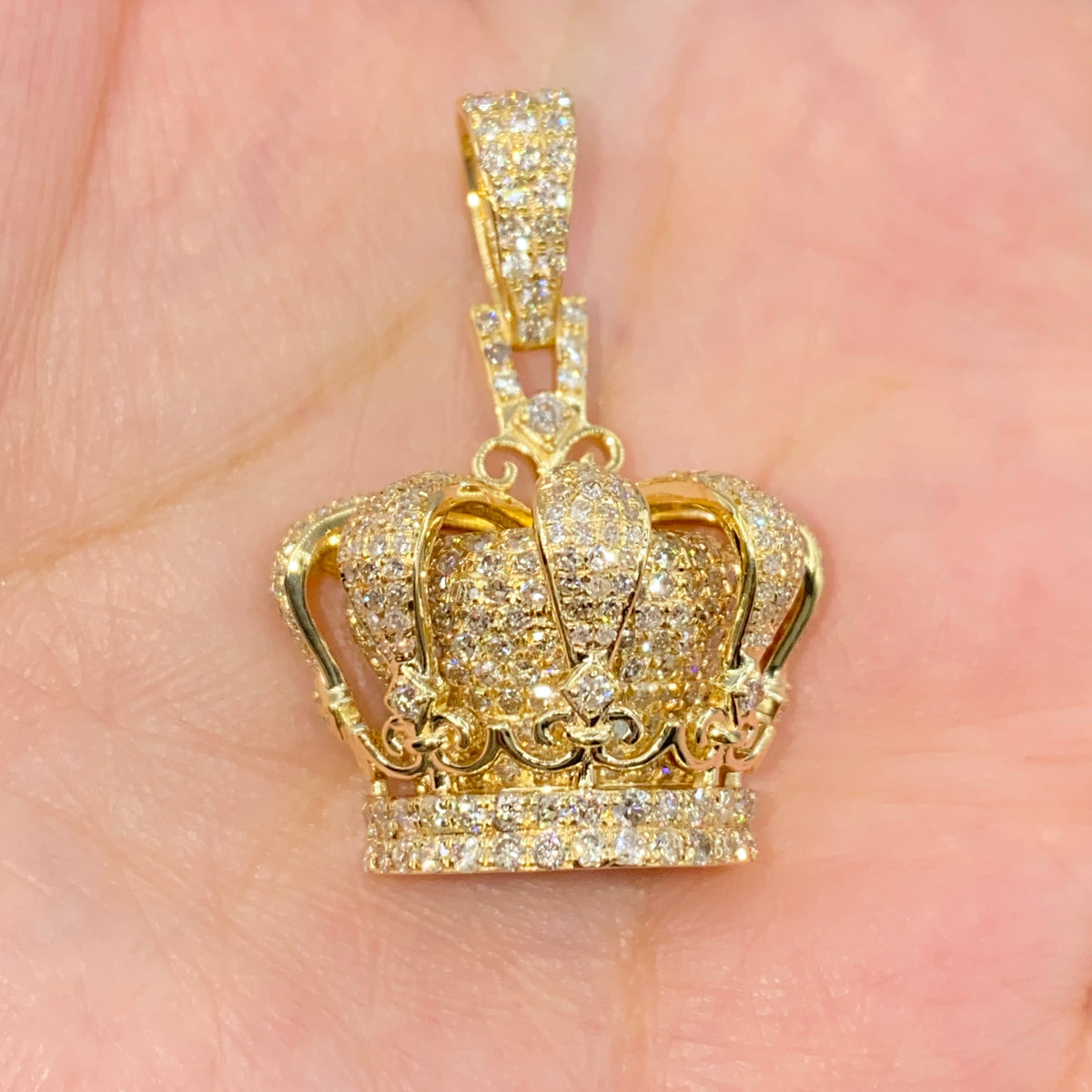 10K Gold Regal Crown Diamond Pendant in yellow gold - close-up product photo