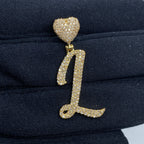 14K Gold Initial L Script Heart Diamond Pendant in yellow gold - close-up product photo