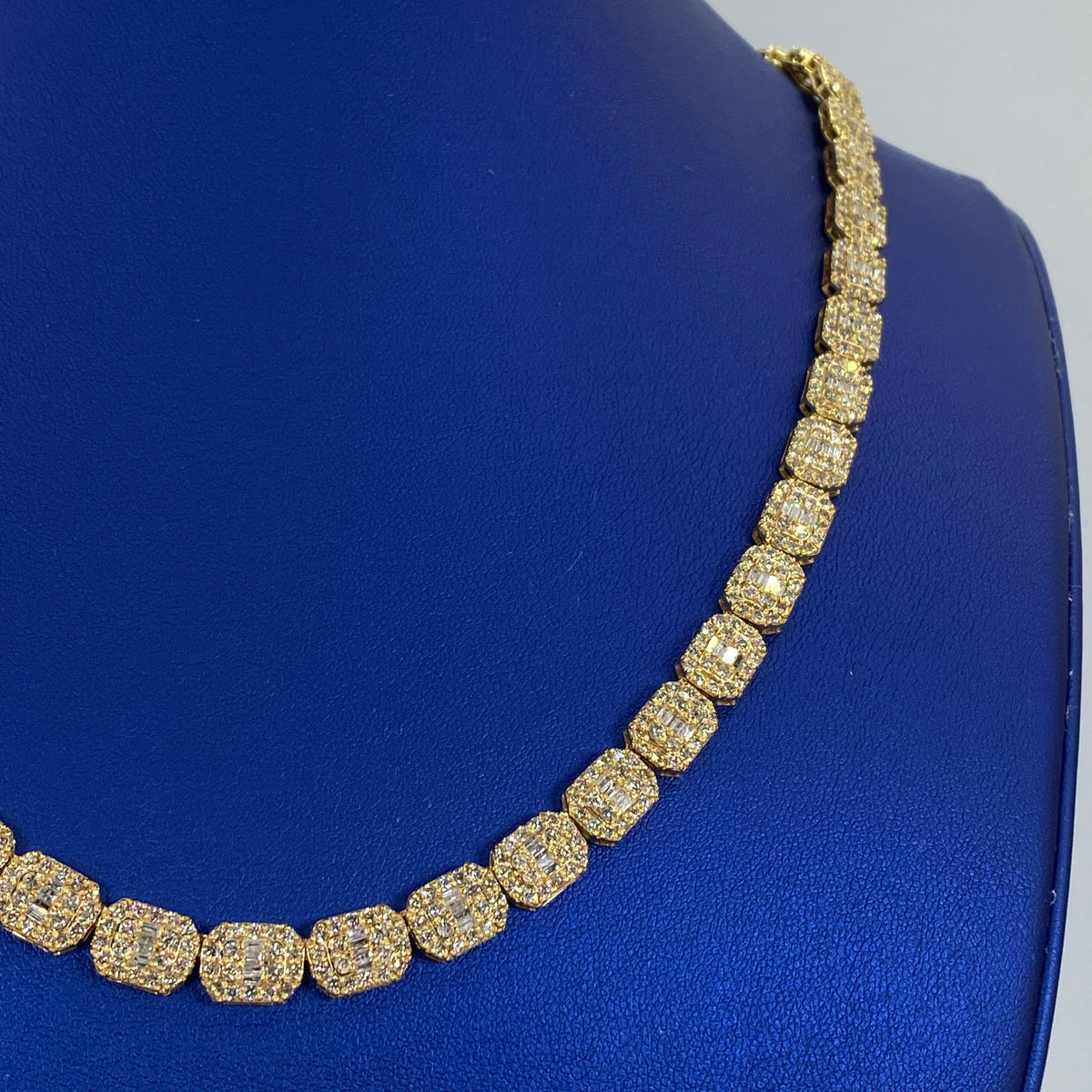 10K Gold 7.5mm Rectangle Diamond Baguette Link Chain 20 in in yellow gold - close-up product photo