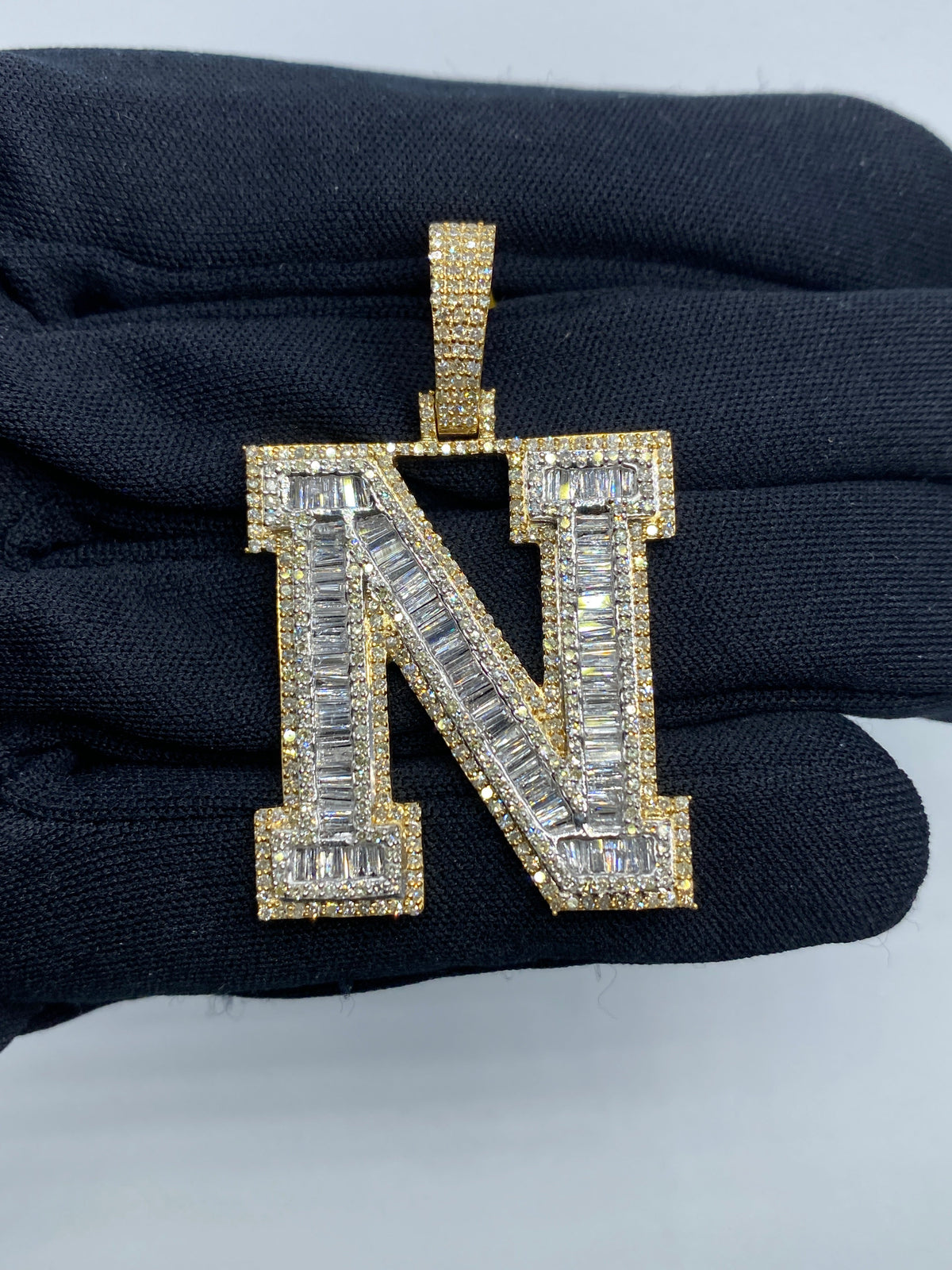 Initial N Baguette Diamond Pendant in yellow - close-up product photo