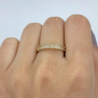 10K Gold Diamond Baguette Half-Way Eternity Band Ring in yellow gold - close-up product photo