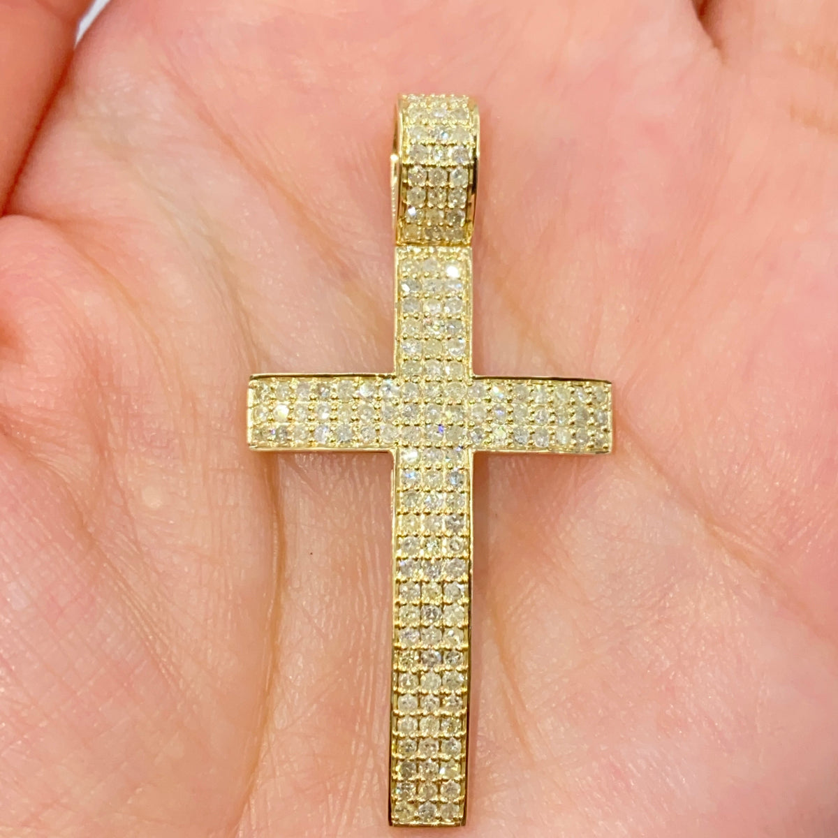 10K Gold Modern Cross Diamond Pendant in yellow gold - close-up product photo