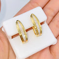 14K Gold Diamond Baguette Hoop Earrings in yellow gold - close-up product photo