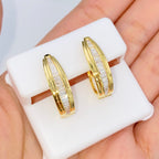 14K Gold Diamond Baguette Hoop Earrings in yellow gold - close-up product photo