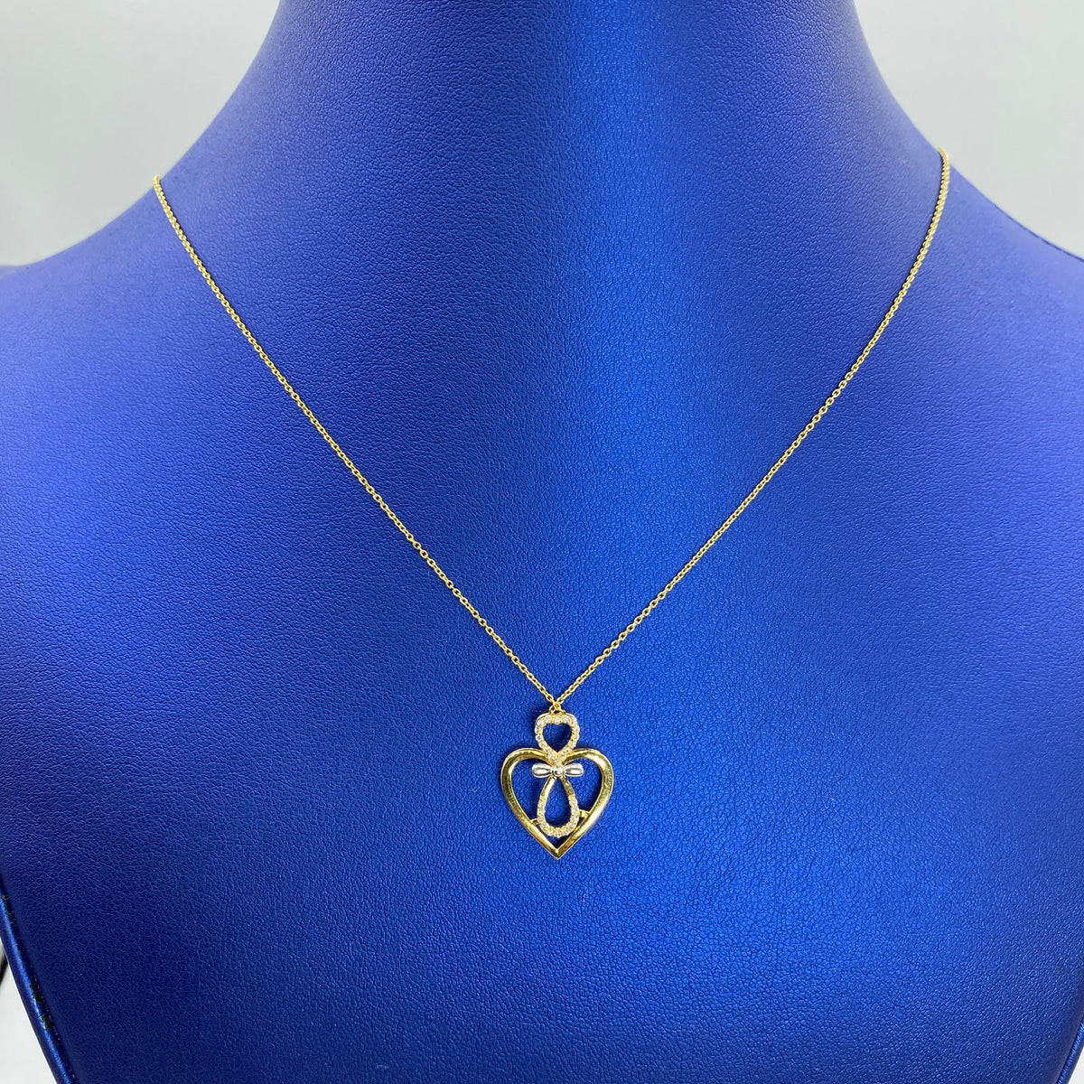 10K Gold and Diamond Heart Necklace in yellow gold - close-up product photo