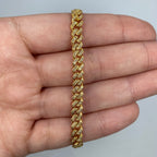 10K Gold 5.5mm Cuban Link Diamond Bracelet 7–8 in in yellow gold, 7" - close-up product photo