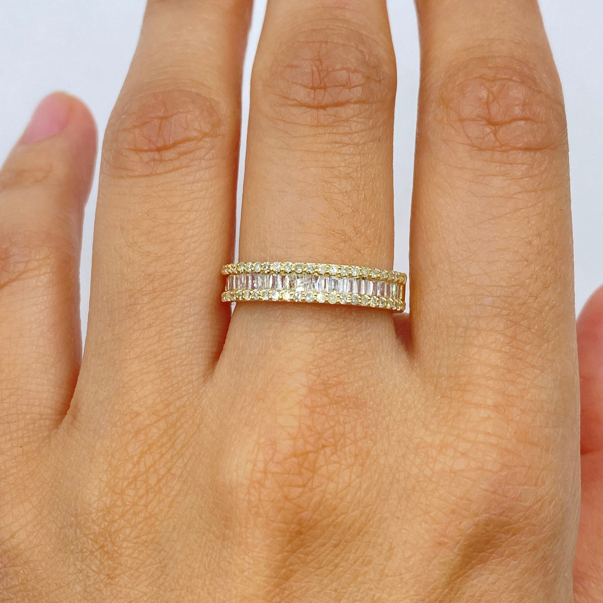 10K Gold Diamond Baguette Band in yellow gold, 4.3mm - close-up product photo