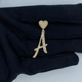 14K Gold Initial A Script Heart Diamond Pendant in yellow gold - close-up product photo
