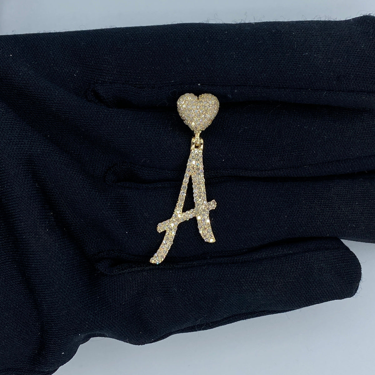 14K Gold Initial A Script Heart Diamond Pendant in yellow gold - close-up product photo