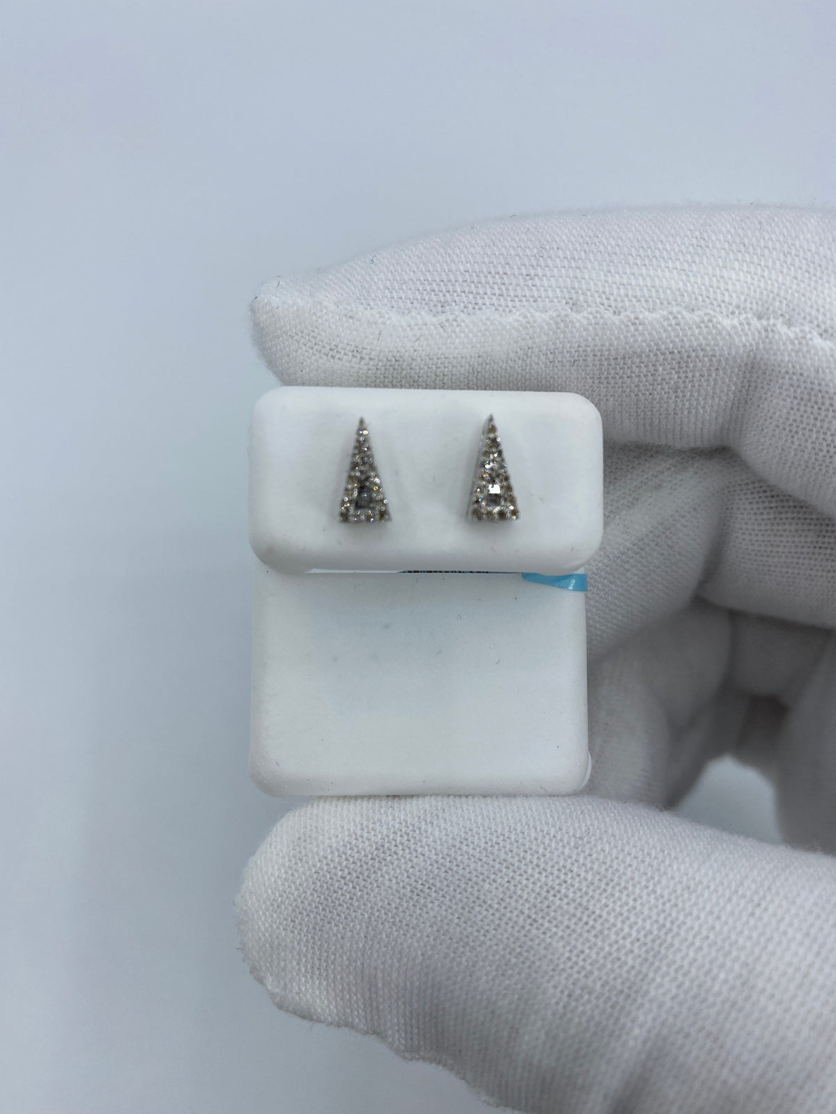 14K Gold Small Isosceles Triangle Diamond Baguette Earrings in white gold - close-up product photo