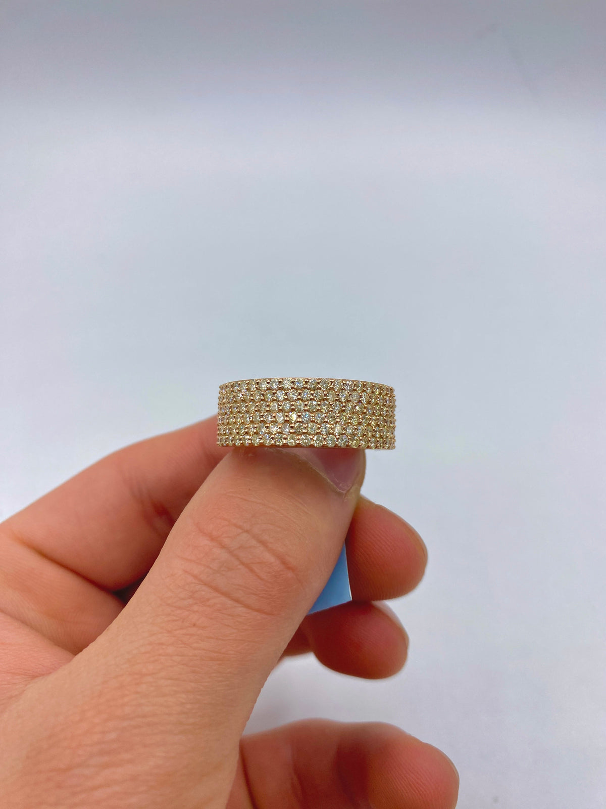 14K Gold Iced Diamond Wedding Stack Ring Band in rose gold - close-up product photo
