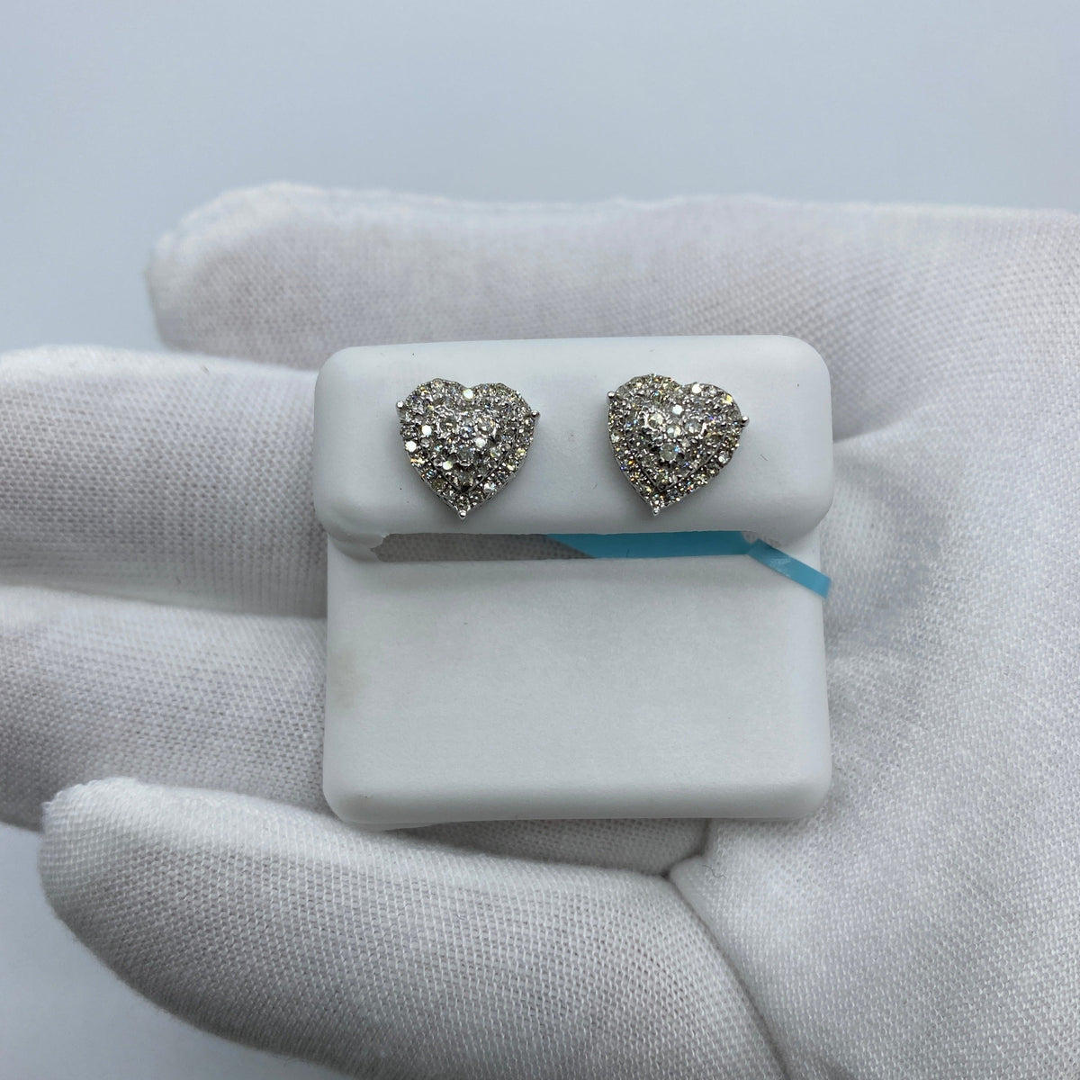 14K Gold Heart Halo Diamond Earrings in white gold - close-up product photo