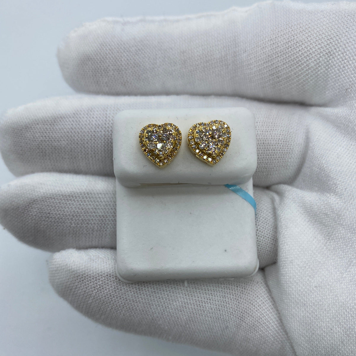 14K Gold Halo Heart Diamond Earrings in yellow gold - close-up product photo