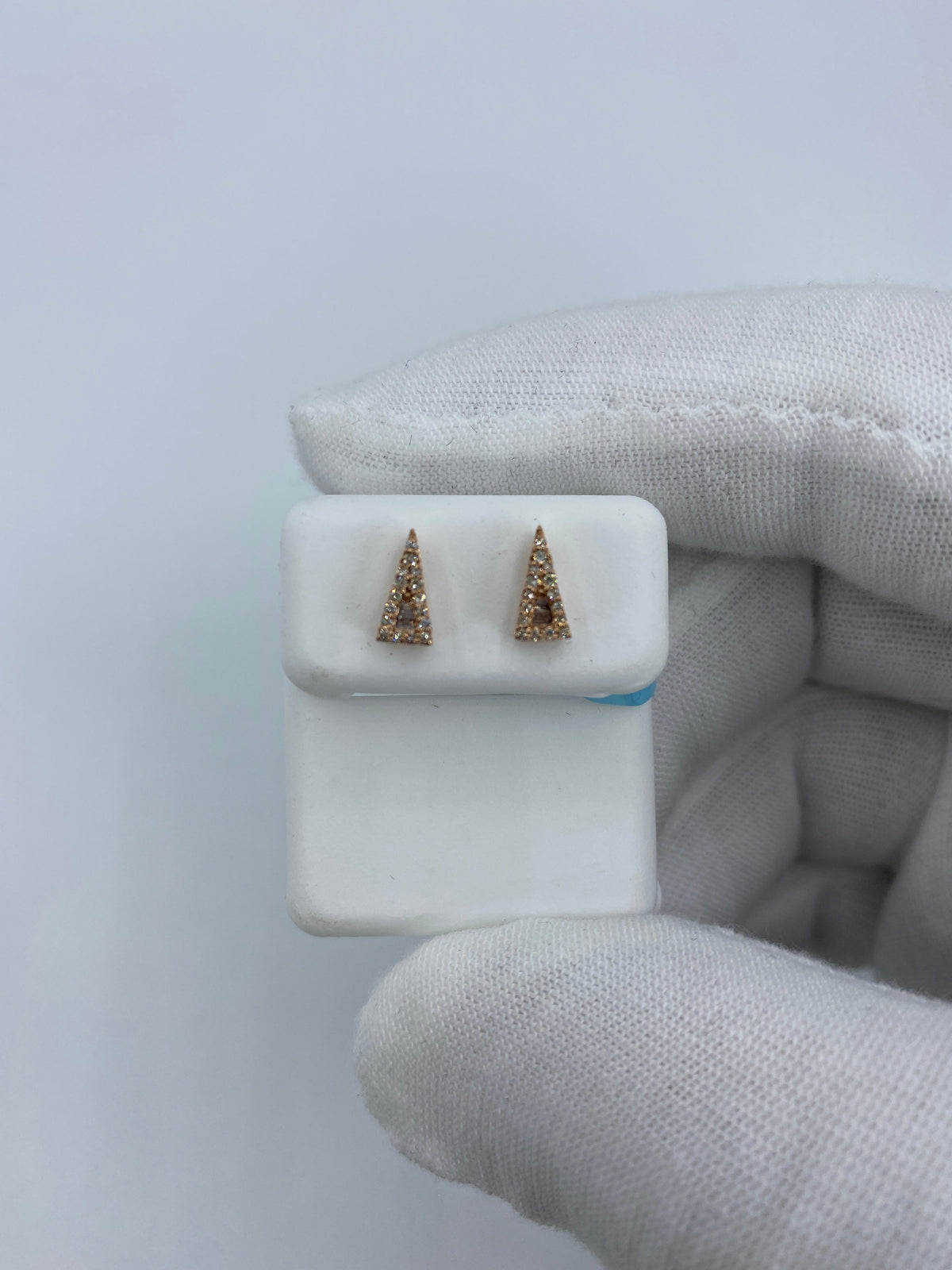 14K Gold Small Isosceles Triangle Diamond Baguette Earrings in rose gold - close-up product photo