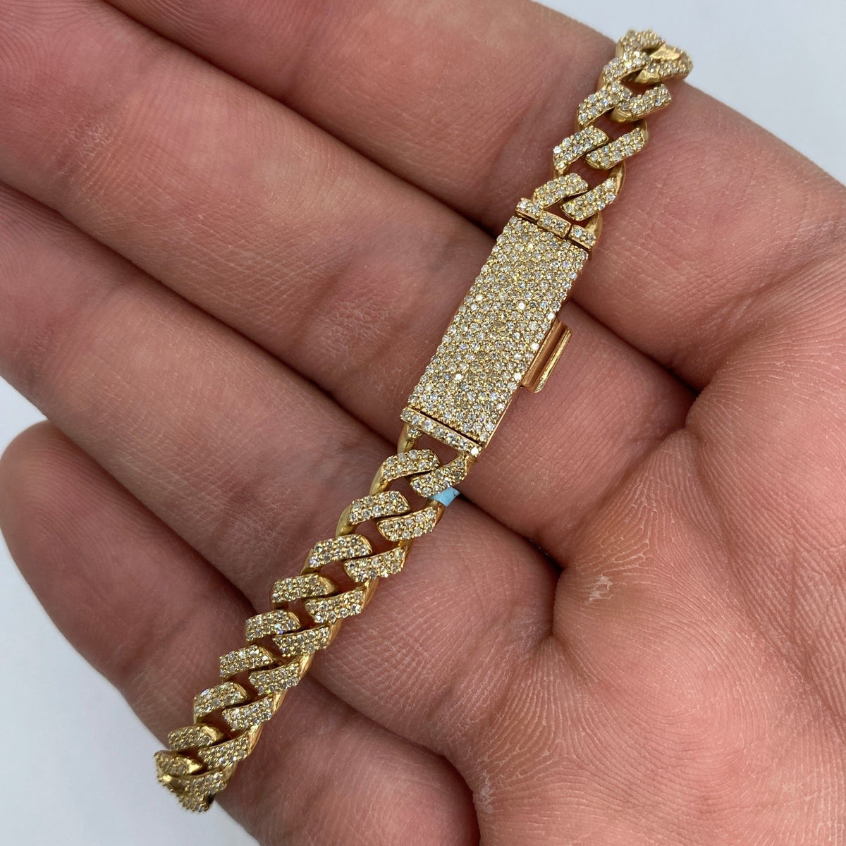 14K Gold 7mm Cuban Link Diamond Bracelet 7.5–8 in in yellow gold, 8" - close-up product photo