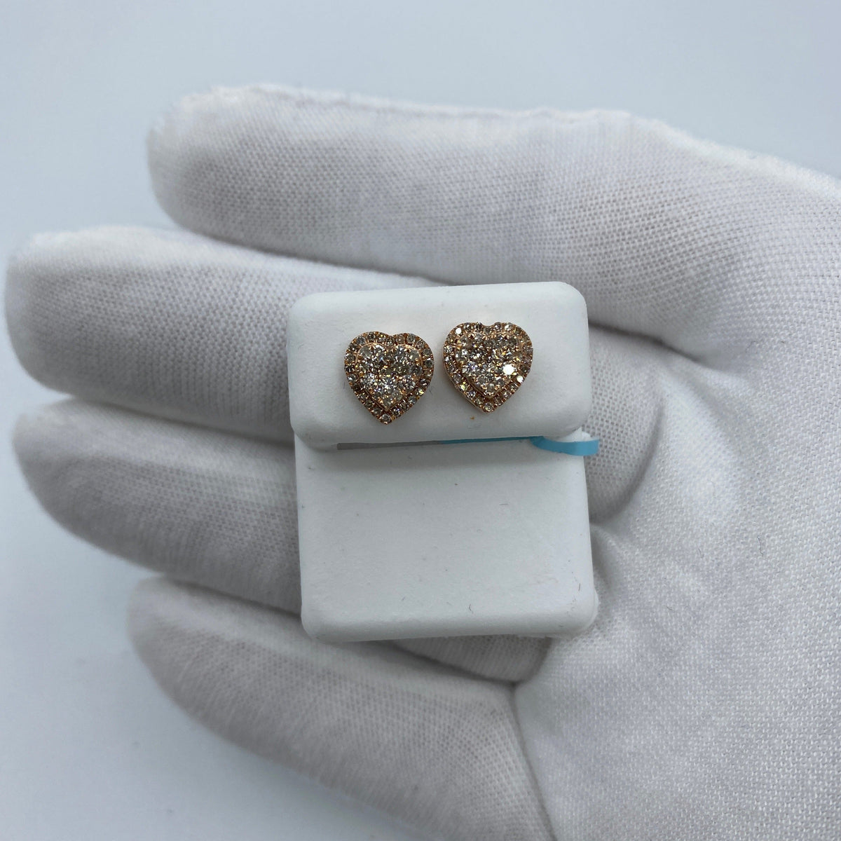 14K Gold Halo Heart Diamond Earrings in rose gold - close-up product photo
