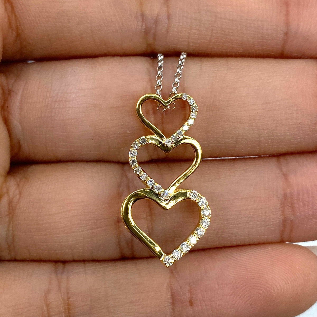 10K Gold Heart Charm Stack Diamond Pendant in yellow gold - close-up product photo