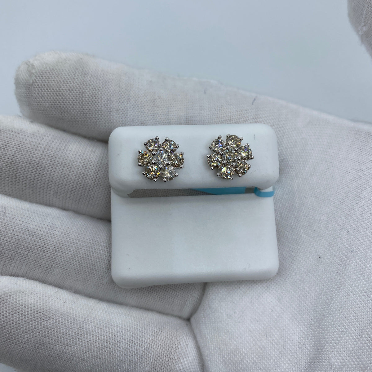 14K Gold Snowflake Diamond Earrings in white gold, Large - close-up product photo