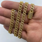 10K Gold 6.5mm Cuban Link Diamond Baguette Chain 18–24 in in yellow gold, 22" - close-up product photo